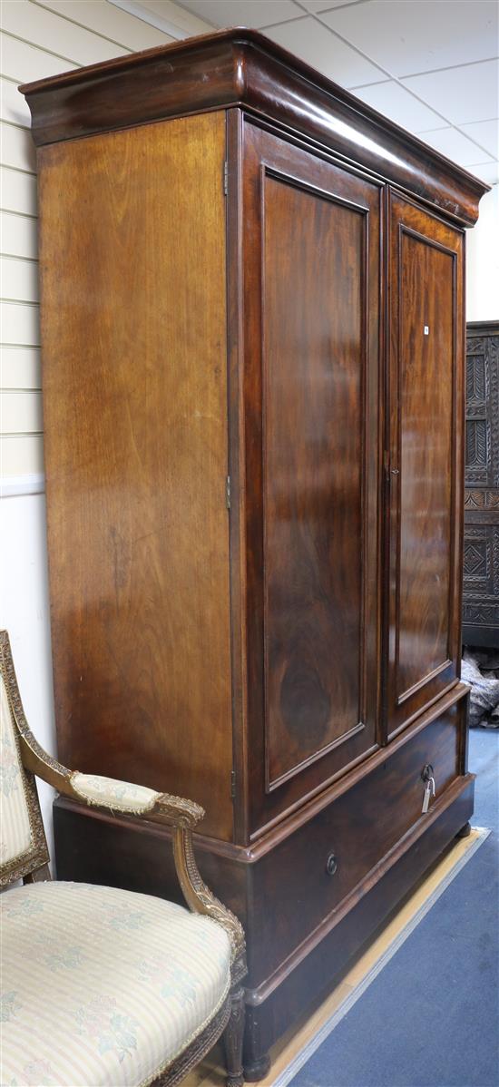 A Victorian mahogany linen press fitted sliding trays W.140cm